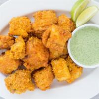 Fish Pakora · Swai Fish fritters marinated with in  house blended spices battered lightly with chickpea fl...