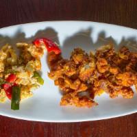 Fish Chilli · Lightly battered fish sautéed with fresh bell pepper, onion, and tomato in our signature chi...