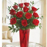 Blooming Love Red Rose Bouquet · Send love in bloom with our striking bouquet of one dozen long-stem red roses. Beautifully d...