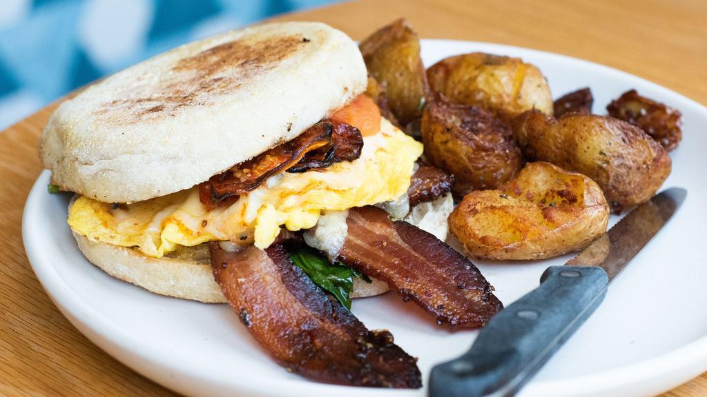 Prep'S Breakfast Sammie · Our bacon muenster and white cheddar roasted tomatoes spinach scrambled egg tomato aioli english muffin side of prep's potatoes.