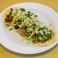 4 Street Tacos · Comes with Onions & Cilantro