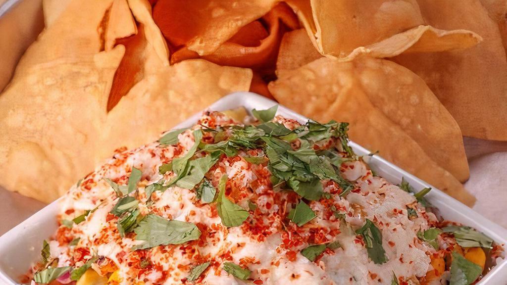 Elote Salsa & Chips · Fire roasted sweet corn tossed with pico de gallo, cilantro lime crema, queso fresco, and tajin. Served with tortilla chips.