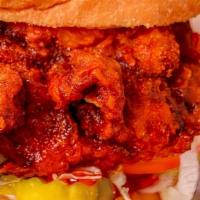 Crispy Chicken Sandwich · Buttermilk marinated chicken thighs breaded and fried to perfection.  Served with mayo, pick...