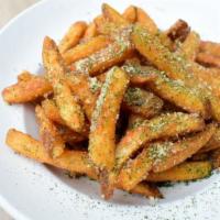 Garlic Parmesan Fries · fries tossed in house garlic parmesan seasoning, served with ketchup