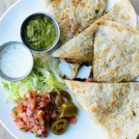 Basil Quesadilla · Ground beef, bell peppers, onions, mushroom, Thai basil, mozzarella cheese topped with sour ...