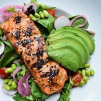 Grilled Miso Salmon Salad · Mixed greens, edamame, radish, avocado, tomatoes, and pickled onions tossed in soy-ginger vi...
