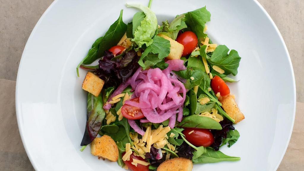 House Salad · mixed greens with shredded cheddar, 
tomatoes, pickled red onions, croutons
and choice of dressing