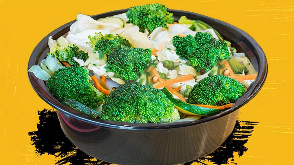 Veggie Bowl · Stir fried veggies broccoli, carrots, onion, zucchini, and cabbage with your choice of rice or noodles.