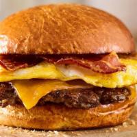 Breakfast Smashburger · Certified Angus Beef, fresh cracked egg, applewood smoked bacon, aged cheddar cheese, toaste...