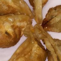 Gun Mandu · Deep fried dumpling six pieces.