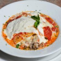 Lasagna · Our traditional lasagna with fresh mozzarella, ricotta and marinara sauce. Available with ch...