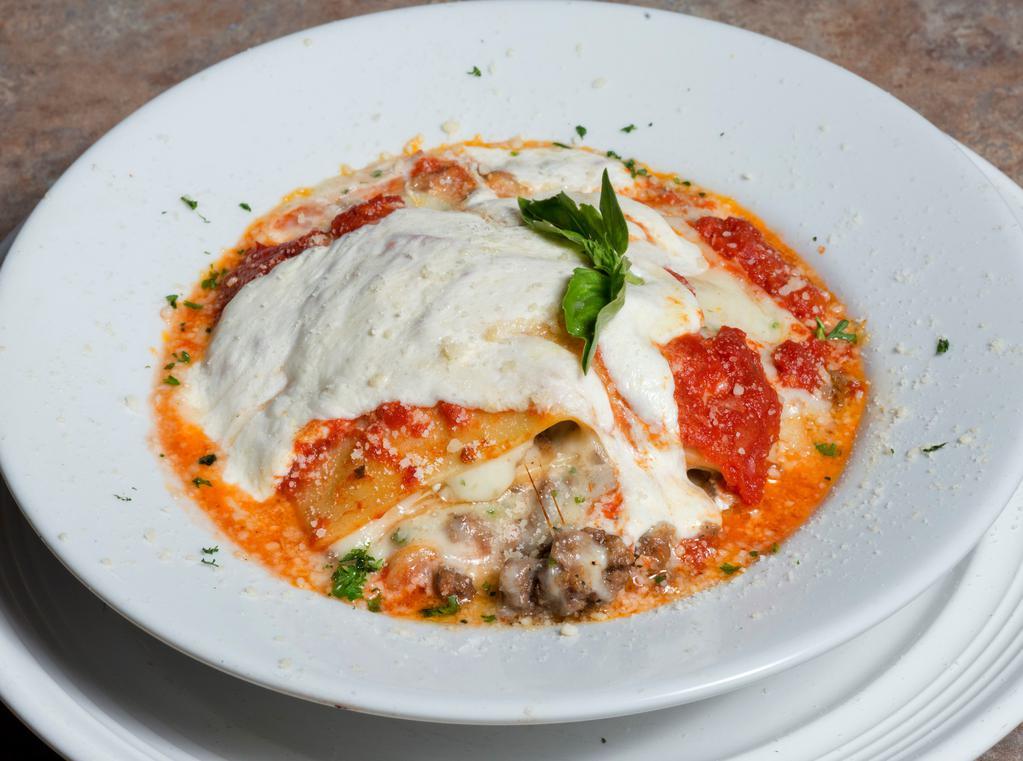 Lasagna · Our traditional lasagna with fresh mozzarella, ricotta and marinara sauce. Available with cheese, meat or spinach.