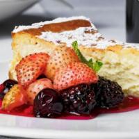Ricotta Cheesecake · Classic Italian ricotta cheesecake with fresh mix berries compote.