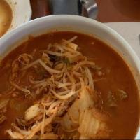 Kimchi Soup · Soup made with kimchi, pork, and tofu. Served with rice.