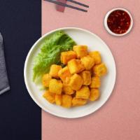 Golden Tofu · Deep-fried tofu served with sweet chili sauce and ground peanuts.