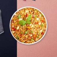 See Ew Stir Fry · Pan-fried brown rice, garlic, sweet basil, onion, carrot, and bell pepper with garlic chili ...