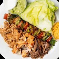Low Carb Fajitas · Meat, lettuce wraps, grilled peppers & onions, cheddar cheese, sour cream, & guac