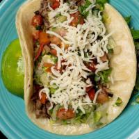 Beef Taco · shredded beef, lettuce, pico, cheese