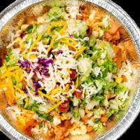 Burrito Bowl · Rice, whole charro beans, meat, lettuce, cheese, pico, & fire roasted corn
