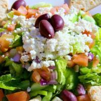 Greek Salad · Romaine, tomatoes, cucumbers, onions, green peppers, feta, and kalamata olives.