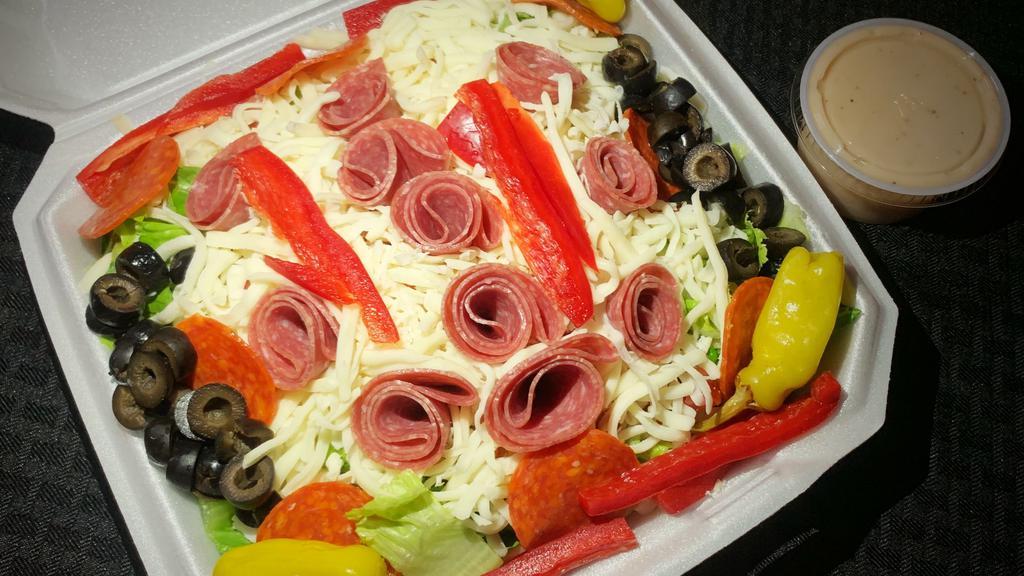 Antipasto Salad · Romaine, tomatoes, red bell peppers, onions, salami pepperonicin, capicole, mozzarella, and black olives.