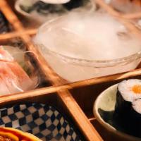 Sake Box · Sake maki, two pieces seared salmon nigiri two pieces salmon nigiri, six pieces salmon sashi...