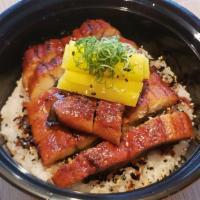 Unagi · Six ounce barbequed eel over rice with pickled radish; comes with house salad & miso soup