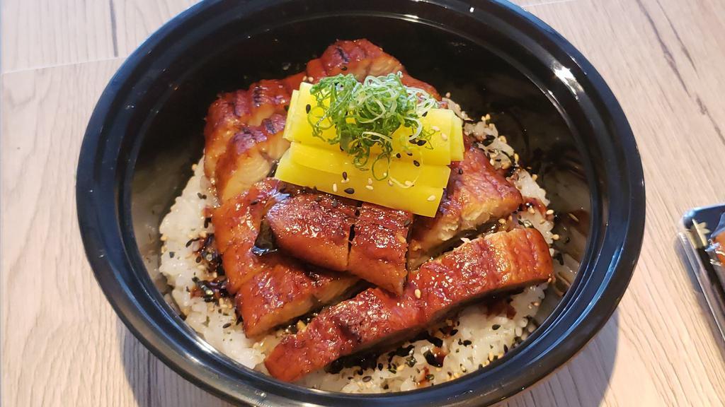 Unagi · Six ounce barbequed eel over rice with pickled radish; comes with house salad & miso soup