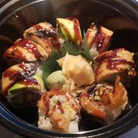 Dragon · (Inside) shrimp tempura roll (top) unagi, avocado (sauce) unagi.