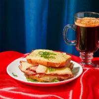 Croque Monsieur · Savory ham and rich gruyere cheese and chives sandwiched between two slices of toasted white...