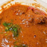Chicken Chettinad  · Medium spicy. Bone-in chicken curry simmered in flavorful gravy made with coconut, green chi...