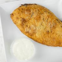 Calzone · With a side of ranch and your choice of 3 toppings.


Choose from:
Anchovies, artichoke hear...