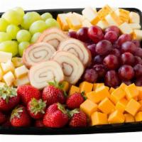 Fruit And Cheese Snack Tray - Small · Includes cubes of Swiss, Muenster and Cheddar cheese refreshingly combined with Grapes and S...