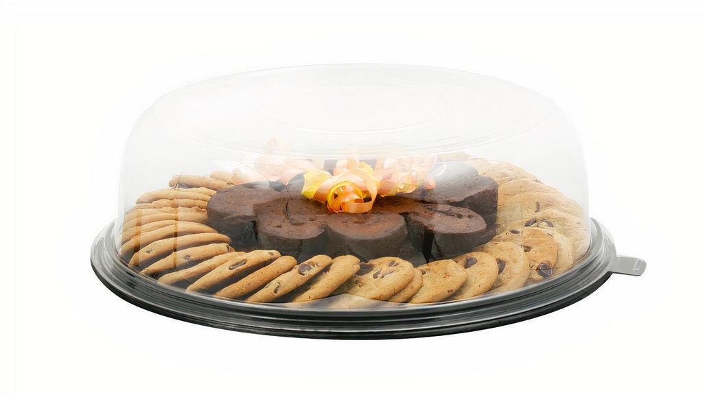 Cookie & Brownie Bite Platter Medium 40Ct · Hand crafted assortment of Sugar, Chocolate Chip, Candy and Oatmeal Raisin cookies combined with an assortment of Sugar Dusted and Fudge brownie bites.  Serves 24-30.