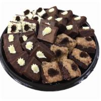 Brownie Platter - Cream Cheese, Fudge, And German Iced Brownies 24Ct · A decadent assortment of Fudge, German Chocolate and Cream Cheese iced brownies. Serves 20-24.