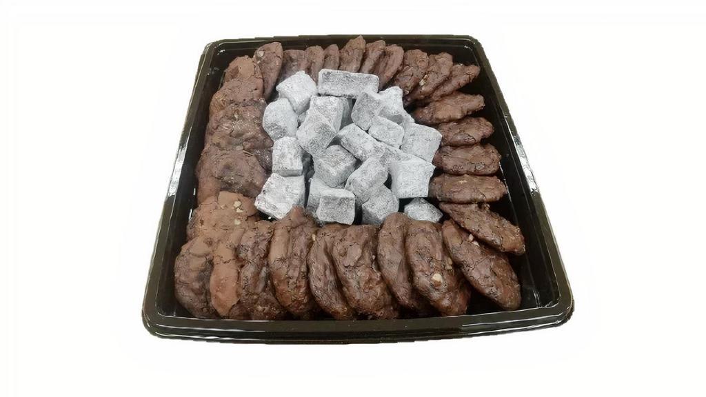 Chocolate Chewies W/ Sugar Brownie Bites 40Ct · Hand crafted Chocolate Chewie Cookies combined with sugar dusted Brownie bites. Includes 40 pieces.