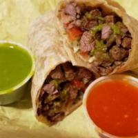 Carne Asada Burrito · Steak guacamole and pico de gallo.