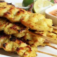 Chicken Satay (4) · Grilled tender strips of marinated chicken on skewers, served with peanut sauce and cucumber...