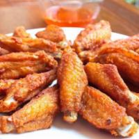 Chicken Wing (9 Pcs) · Perfectly seasoned, served with sweet chili sauce.