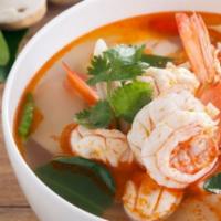 Tom Yum Soup · Mild. Shrimp, chicken or veg & soft tofu. Mushrooms, tomatoes in a spicy broth with a touch ...