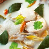 Tom Kha Soup · Coconut base hot & sour soup with mushrooms, onion, lemongrass, lime leaves, rice noodles, c...