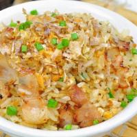 Garlic Fried Rice · Stir-fried garlic, onion, and ghee with choice of meat.