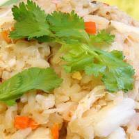Crab Fried Rice · Stir-fried crab meat, 2 eggs, peas, and carrot.