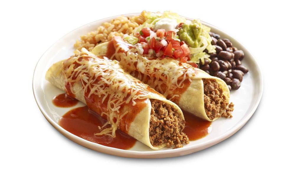 Enchilada Platters · Choose from two enchiladas or one enchilada and one taco. Includes rice, beans, guacamole and sour cream.