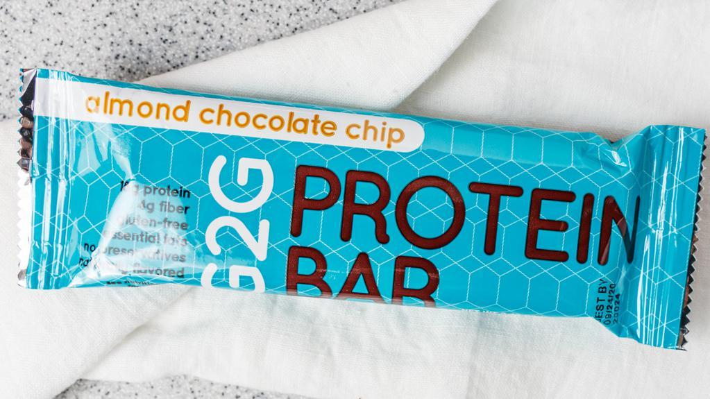 G2G  Protein Bar Almond Chocolate Chip · G2G  Protein Bar Almond Chocolate Chip  With 18grams of Isolate Whey Protein and 4G of Fiber. Gluten Free and packed with Essential Fats. Made in the USA with no preservatives and pressed fresher and refrigerated for ultimate freshness and taste!
