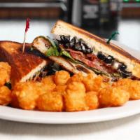 Quinn'S Specialty Grilled Cheese Supreme · American and Swiss cheese, bacon, mac, lettuce, tomato, mushrooms, artichoke hearts, and oli...