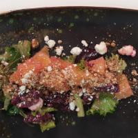 Ruby Salad · Gluten free and vegetarian. Confit beet salad with goat cheese, caramelized pecans and organ...