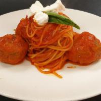 Spaghetti And Meatballs · Spaghetti and meatballs with fresh basil, Parmesan cheese and marinara sauce.