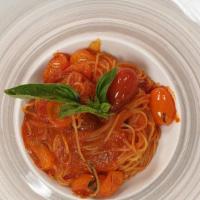 Capellini Al Pomodoro · Vegan. Dry pasta. Angel hair, cherry tomatoes, marinara, roasted garlic and fresh basil.