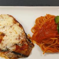 Eggplant Parmigiana · Vegetarian. Tomatoes, mozzarella cheese and fresh oregano, served with spaghetti pasta in a ...